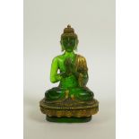 A green Peking glass Buddha seated in meditation on a lotus flower, with gilt highlights, 5" high