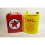 Four enamelled metal petrol cans, 12" high