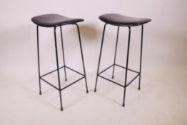 A pair of 1970s tubular metal and leatherette bar stools, 28" high