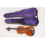 A violin with bow in case, labelled inside C.H. Trewhella, Devonport, no.47, 1913, 23½" long, 14½" t