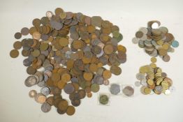 A large collection of assorted vintage and current coinage, mostly British