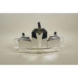 An Art Deco style three piece silver plated tea set, 15½" wide