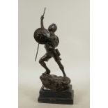 A bronzed spelter figure of a boy scout, 14½" high