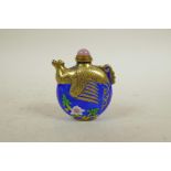 A Chinese brass snuff bottle in the form of a phoenix with enamelled highlights, 2½" high