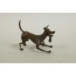 A Japanese bronzed metal figure of an enthusiastic dog, in the manner of the Disney Pixar dog