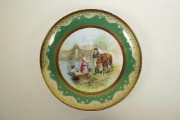 A Vienna porcelain charger, decorated with a hand finished transfer print depicting two women