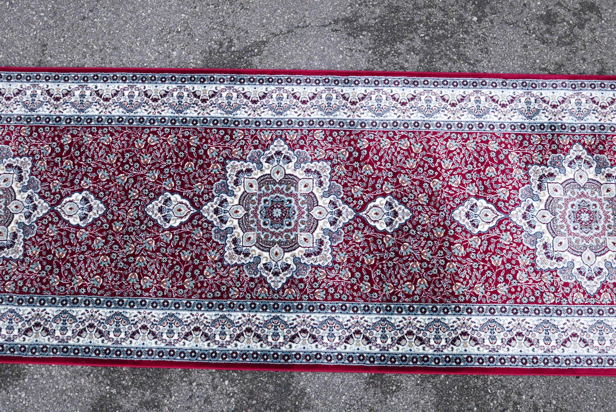 A Turkish red ground deep pile runner decorated with floral medallions on a blue field with cream - Image 3 of 5