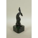 A bronze figure of a hare, 8" high
