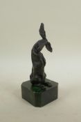 A bronze figure of a hare, 8" high
