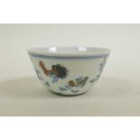 A Chinese doucai porcelain tea bowl with chicken decoration, seal mark to base, 3" diameter