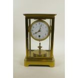 An early C20th Claude Grivolas brass 400 day silk suspension mantel clock, the enamel dial with