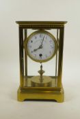 An early C20th Claude Grivolas brass 400 day silk suspension mantel clock, the enamel dial with