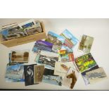 A quantity of assorted vintage postcards including topographical and social history, 6" x 4"