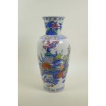 A Chinese polychrome porcelain vase decorated with objects of virtu, auspicious flowers and fruit, 6