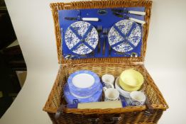 An Optima wicker picnic basket and contents, 23½" x 15" x 8"