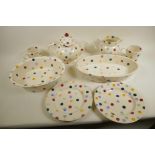 Emma Bridgewater polkadot pottery, two oval serving dishes, 11½" x 9½" and 13" x 8", teapot, milk