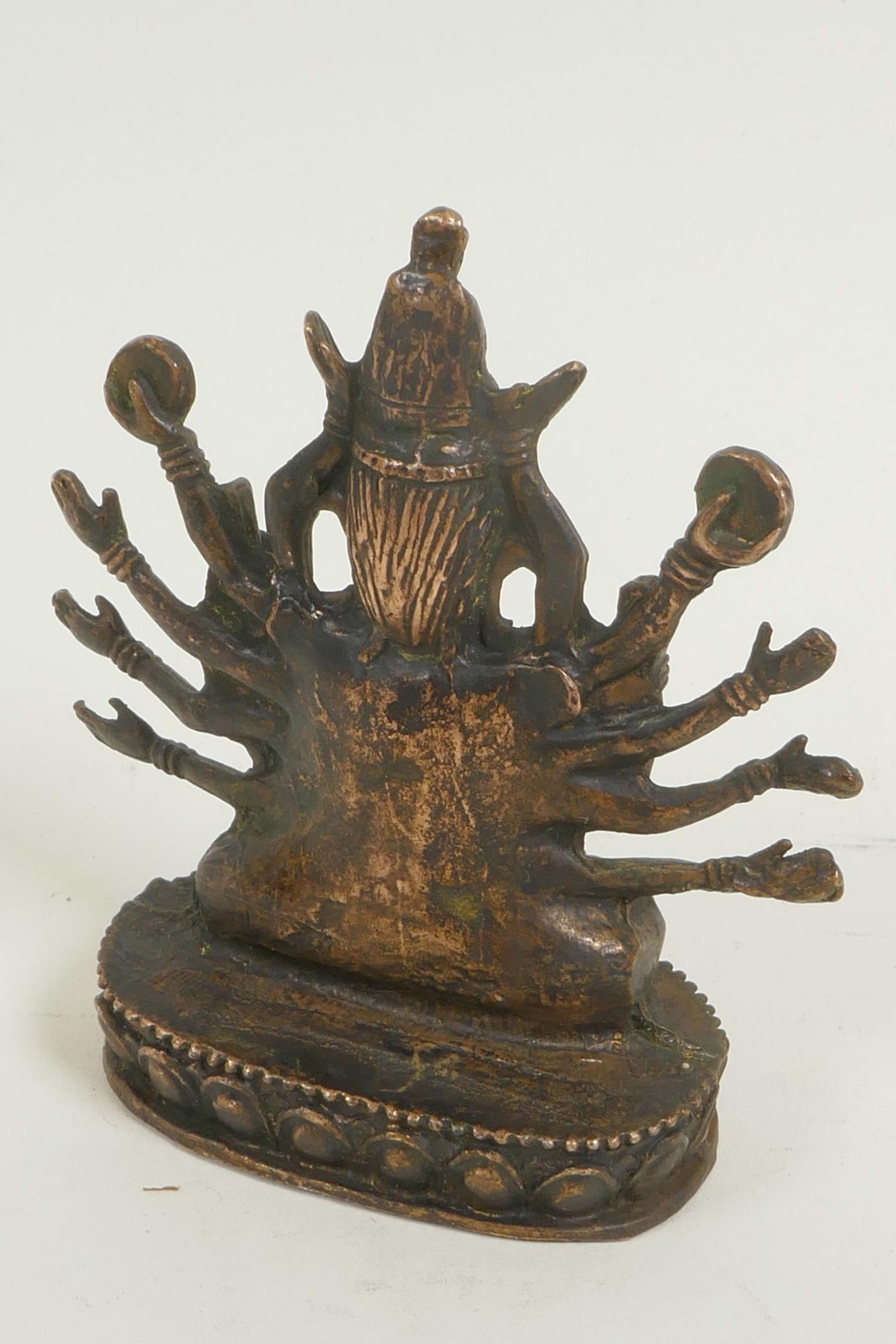 A bronze figure of a Hindu deity, seated in meditation on a lotus throne, 3" high - Image 3 of 3