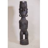 An African carved wood figure, 40" high