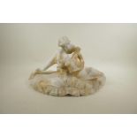 A classical marble figure group carved in the form of a semi clad couple, A/F, 21" wide