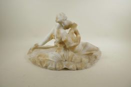 A classical marble figure group carved in the form of a semi clad couple, A/F, 21" wide