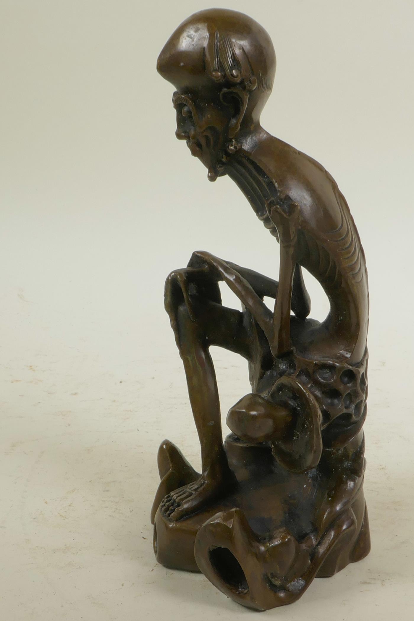 A bronze figure of a skeletal man, 8½" high - Image 5 of 7