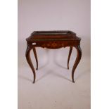 A French C19th inlaid burr walnut jardiniere with ormolu mounts and tapered cabriole legs, 29½" x