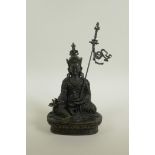 A Sino-Tibetan bronze of Buddha seated on a lotus throne, 10" high