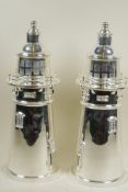 A pair of silver plated cocktail shakers in the form of lighthouses, 14" high