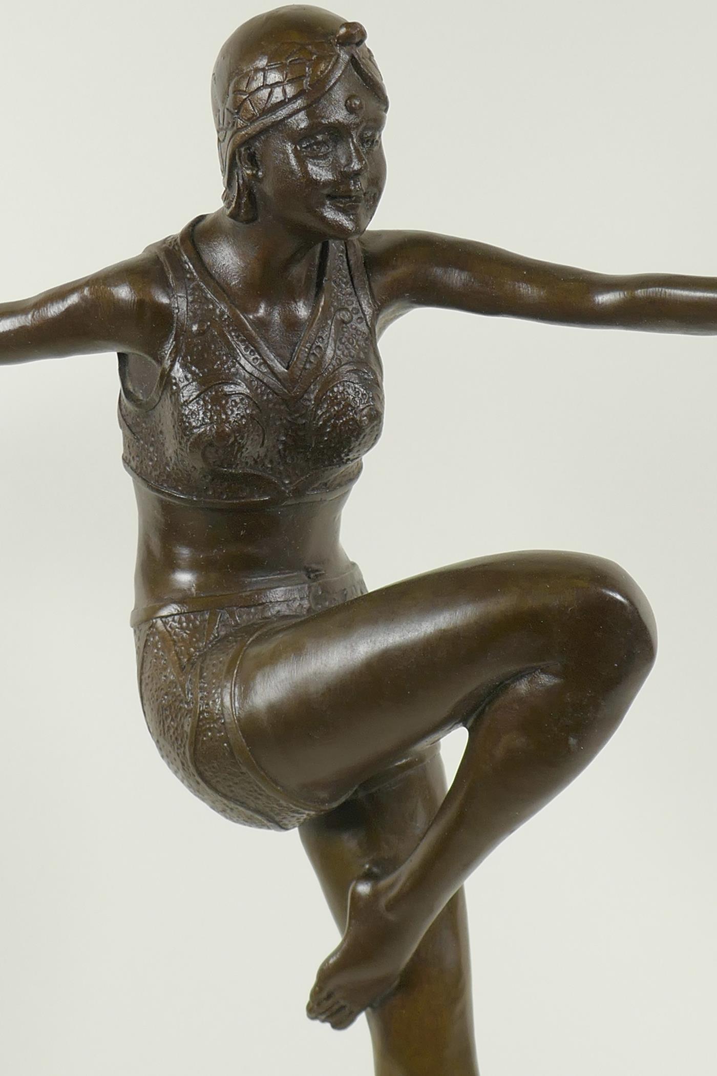 An Art Deco style bronze figure of a dancing girl, on a marble plinth, 22" high - Image 2 of 3