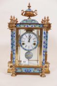 A French style brass and glass cased 'pendulum clock' with cloisonne enamel decoration and painted