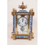 A French style brass and glass cased 'pendulum clock' with cloisonne enamel decoration and painted