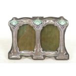 A sterling silver Art Nouveau style double photo frame and apertures, 1½" x 2½"