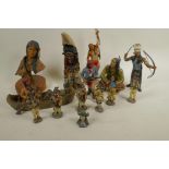 A collection of North American 'First Nation' figures, largest 9½" high