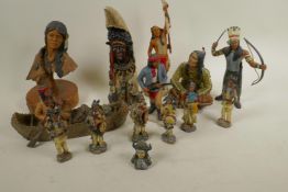 A collection of North American 'First Nation' figures, largest 9½" high