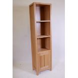 A contemporary oak open bookshelf, 17" x 12" x 68"