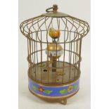 A brass and cloisonne birdcage automaton clock, 7½" high
