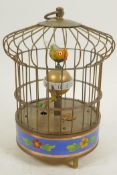 A brass and cloisonne birdcage automaton clock, 7½" high