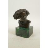 A bronze bust of a woman, 5½" high