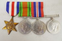 A set of three British Second World War service medals together with a WW2 campaign medal