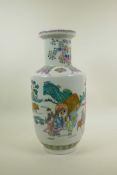 A Chinese famille verte porcelain rouleau vase decorated with travellers in a landscape, six