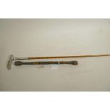 A Malacca riding crop with bound shaft and white metal handle, 27½" long, together with an early