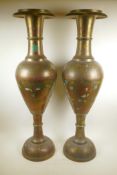 A pair of large Indian brass floor vases with engraved and painted decoration depicting peacocks,