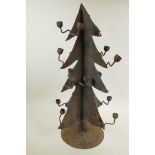 An iron 'Christmas Tree' twenty light candlestick, 24½" high