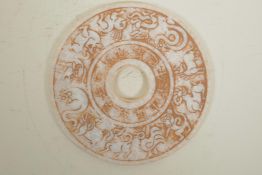 A Chinese hardstone pi disc with moulded Zodiac animal and character inscriptions, 8" diameter