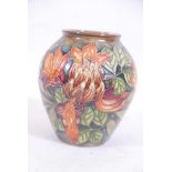 A Moorcroft jar, stamped to base, 8½" high