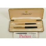 A boxed Parker 61 'Consort' fountain pen and matching propelling pencil