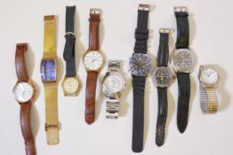 A collection of nine gentlemens' quartz movement wristwatches, including Slazenger, Pod, Van Heusen,