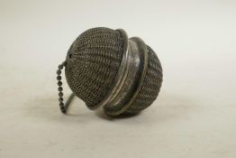 A white metal woven wire incense diffuser, 2½"