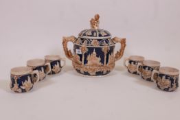 A German wick-werke ceramic punch bowl and cover, and six matching mugs, 12" high