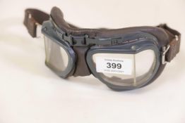 A pair of Halcyon leather goggles